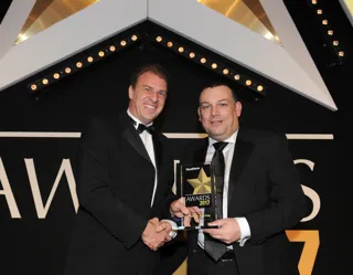 Jo Hammonds, group fleet manager for Mears Group (left), collects the award from Fiat Chrysler Automotive fleet and remarketing director Francis Bleasdale