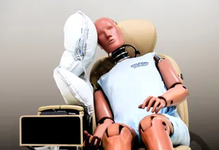 crash test dummy with new air bag deployed