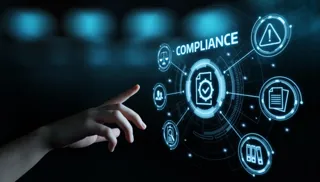 Image of a hand pointing to floating blue icons under the word compliance