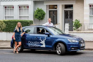 Douglas and Gordon estate agents with company vehicle