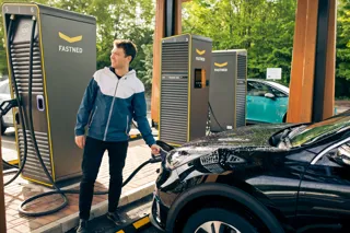 Man using Fastned charge point