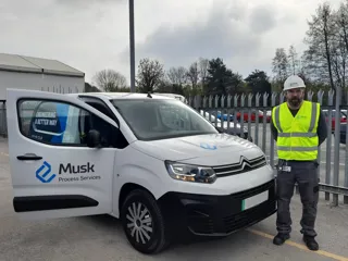 Rick Farrell Site Supervisor Musk Process Services with electric van