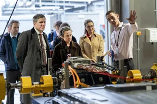 Ford engineer Iain Murray explains EV battery tray testing at the ministerial visit