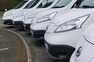 A Line of white vans