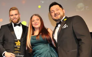 Fleet News Award winner EV ChargeSafe: David Sawford (right), commercial director of award sponsor System Edstrom, presents the award to EV ChargeSafe's CEO and co-founder Kate Tyrrell and its CTO James Coyle