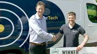 Tom Curtis of DeterTech receiving his prize