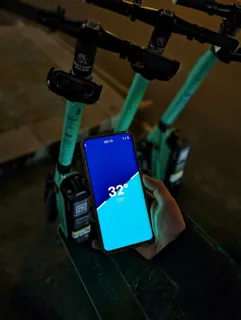 Tier rider doing the in-app drink-riding test on a smartphone