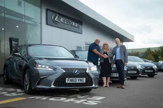 Kelvin Tompkins, managing director of Topps, receives the Lexus ES models from Collette Harris, Toyota and Lexus Fleet Services, and Steve Holler, corporate sales Lexus Leicester