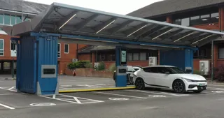 Pop-up solar-powered electric vehicle charging hub, 3ti 