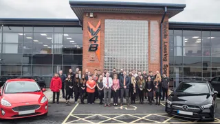 V4B staff outside their headquarters