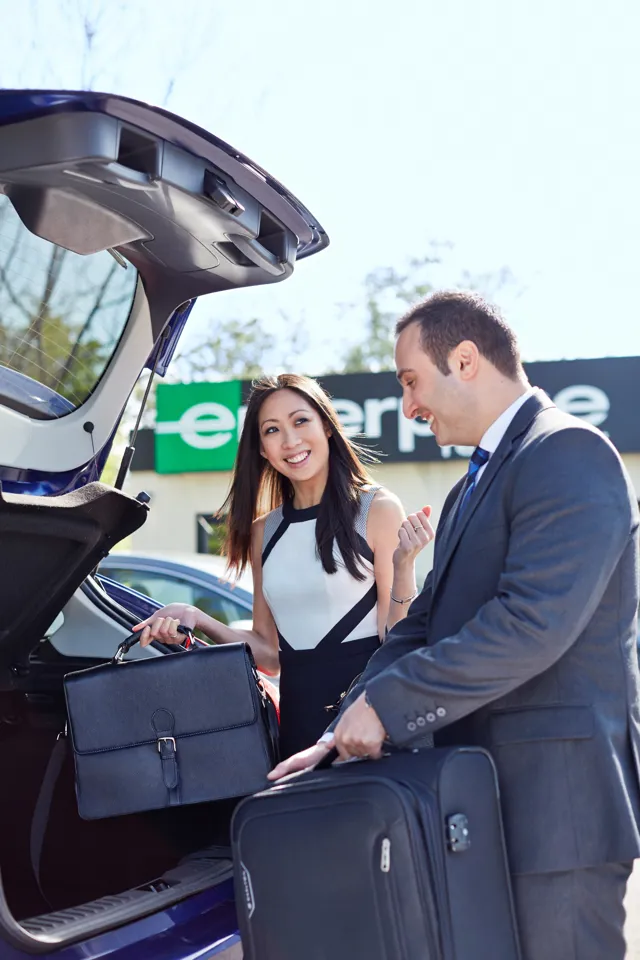 Enterprise Rent-a-Car employee with customer