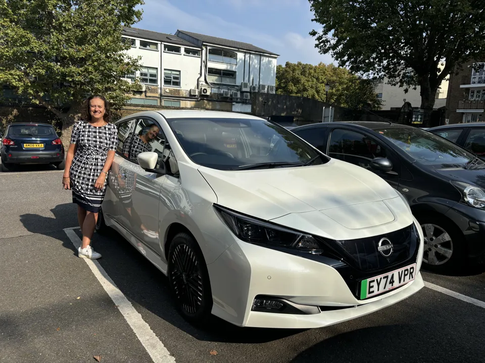 Janet Lewis, director of operations at Central London Community Healthcare NHS Trust, with one of the new electric pool cars.