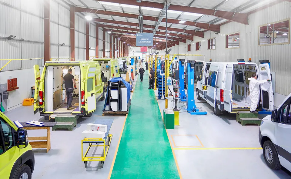Vehicles on the production line at O&H Vehicle Conversions